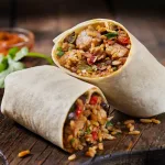 Ogni anno, il primo giovedì di aprile, il mondo celebra il Burrito Day, una giornata dedicata a uno dei piatti più amati dello street food messicano