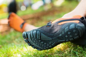 man wearing barefoot shoes.